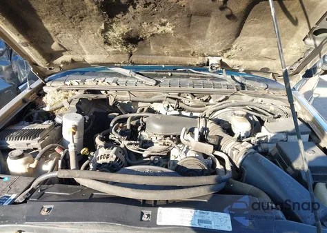 1999 GMC Envoy z USA, uszkodzony, nr VIN 1GKDT13W0X2952675